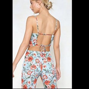 Nasty Gal Pants & Jumpsuits - Nasty Gal floral jumpsuit with cutouts Nasty Gal Pants & Jumpsuits - Nasty Gal floral jumpsuit with cutouts